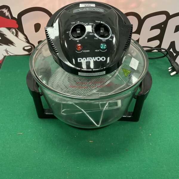 Black Daewoo air fryer on a display surface.