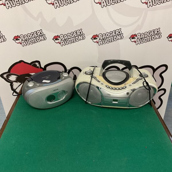 Vintage portable CD player and stereo cassette recorder by Phillips and Goodmans.