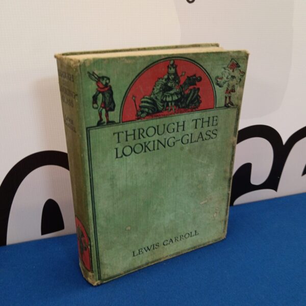 1927 1st edition copy of Lewis Carroll's through the looking glass
