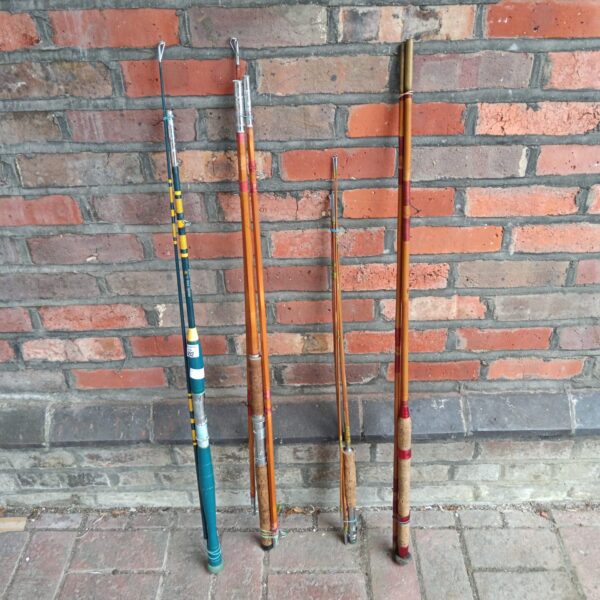 Bundle of four vintage split cane fishing rods for collectors.