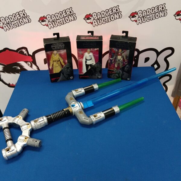 Star Wars Black Series figures and lightsaber accessory lot.