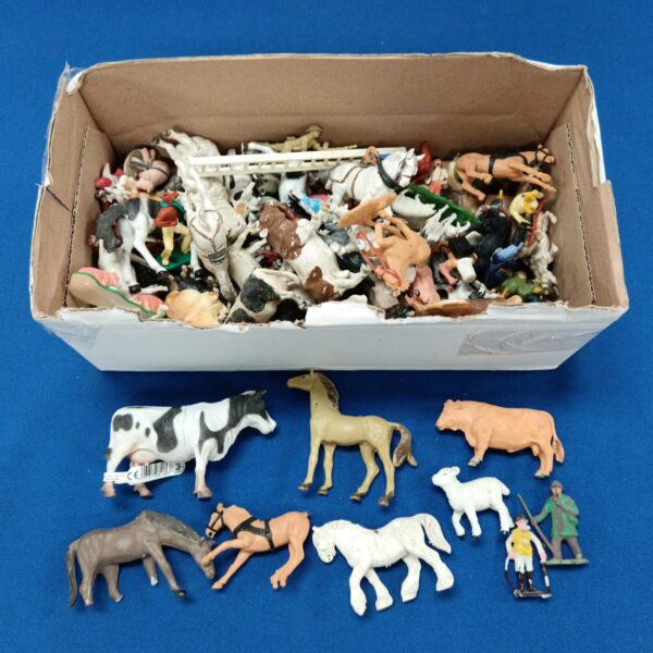 Collection of vintage plastic toy farm animals.