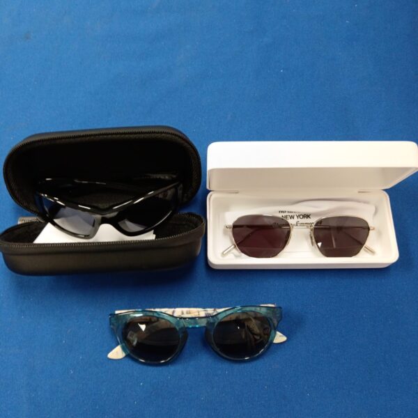 Vintage sunglasses lot featuring Chimi and Vans eyewear.