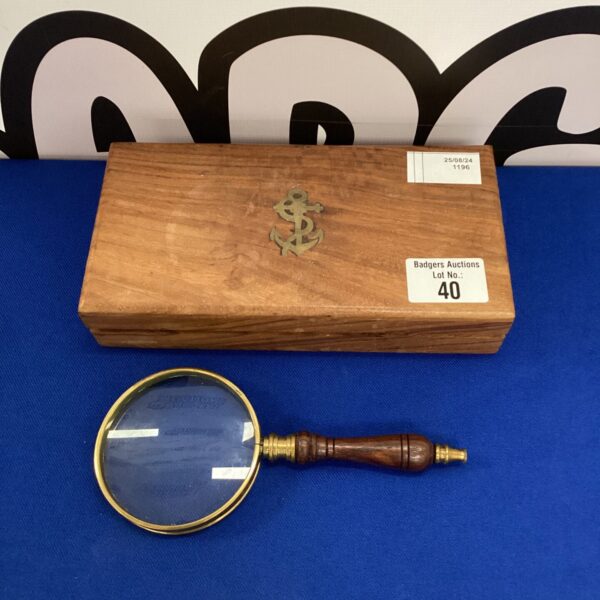 Vintage nautical magnifying glass in original box, maritime instrument.