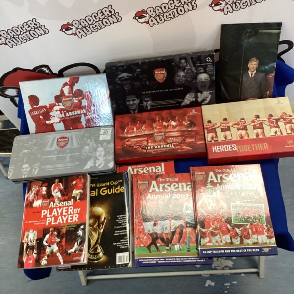 Vintage Arsenal membership packs and annuals collection for football fans.