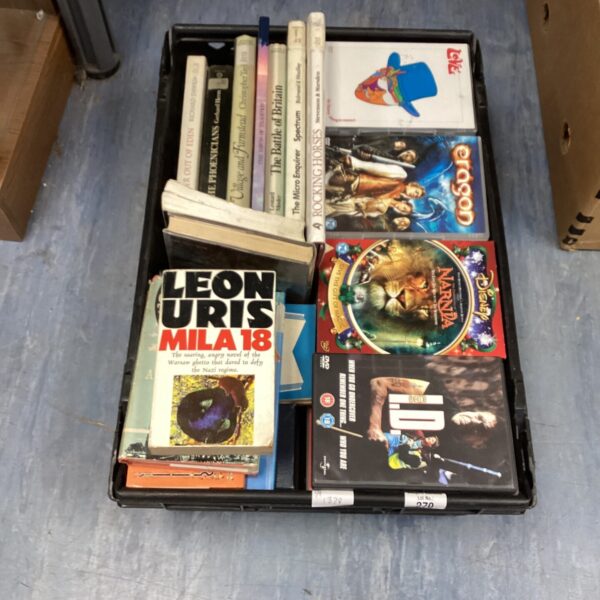 Mixed lot of books and DVDs for entertainment and collecting.
