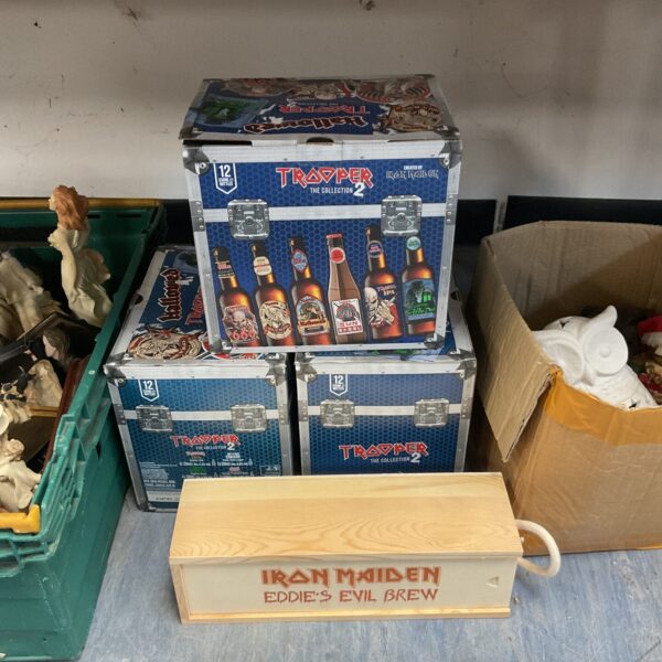 Four cases of unopened Trooper Iron Maiden beer for collectors.