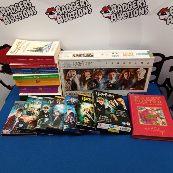 Harry Potter collection featuring books, DVDs, and a puzzle.