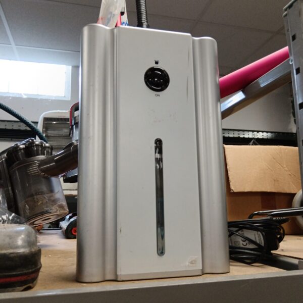 Front view of a small, portable dehumidifier unit.