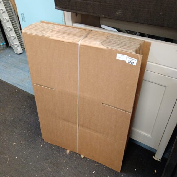 Bundle of twenty cardboard postal boxes for shipping.