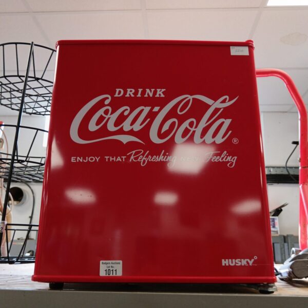 Red Husky Coca-Cola fridge, vintage countertop cooler.