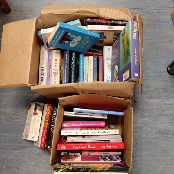 Mixed lot of used paperback books, fiction and cooking.