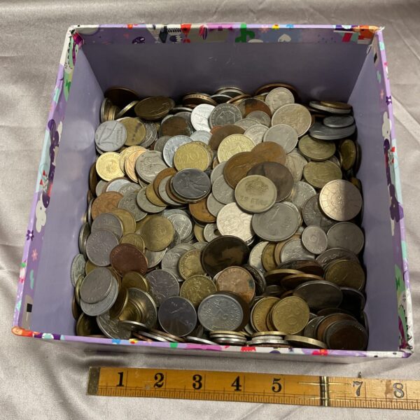 Bulk assortment of mixed coins for collectors and currency enthusiasts.