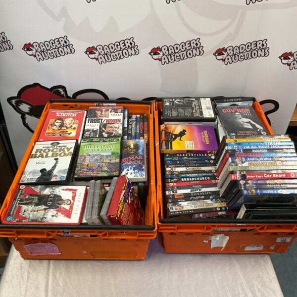 Large lot of assorted DVDs for movie enthusiasts.