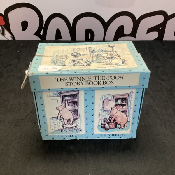 Vintage Winnie-the-Pooh story book box with colourful illustrations.