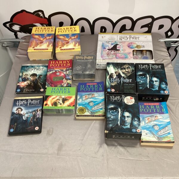 Mixed Harry Potter lot with books, DVDs, and a tie-dye kit for fans.
