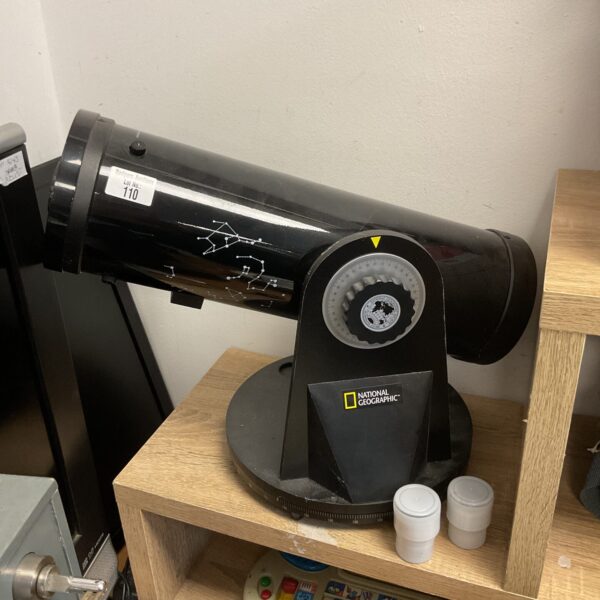 Front view of a used National Geographic telescope with adjustable focus.