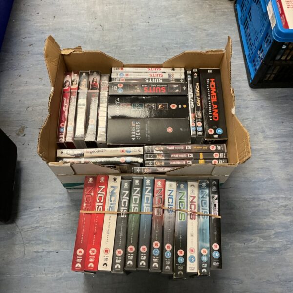 Mixed lot of DVDs including NCIS and House of Cards series.