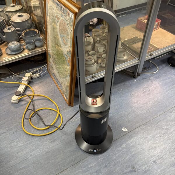 Front view of a silver bladeless fan heater with controls.