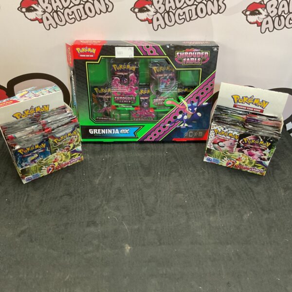 Opened Pokemon booster packs including Greninja EX special edition cards.