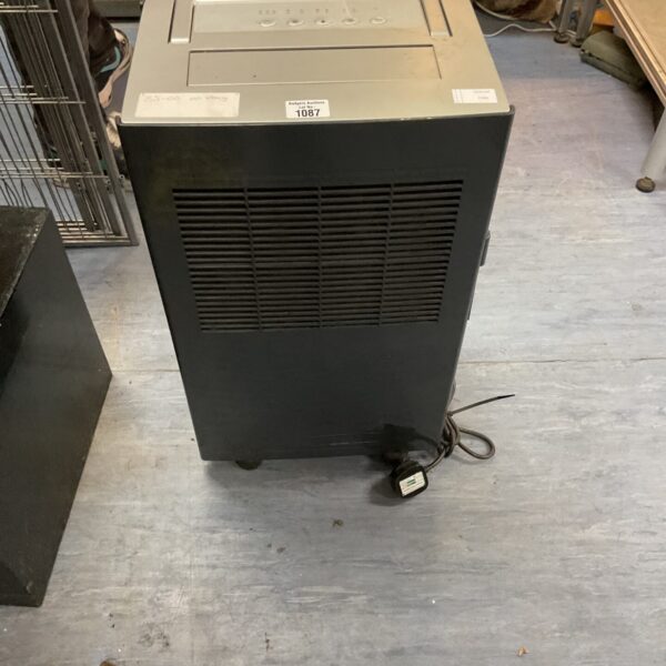 White Challenge dehumidifier, portable air treatment appliance.