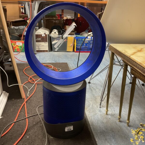 Dyson AM09 air humidifier fan in a home setting.