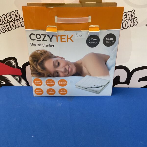 Cozytech electric blanket in a vintage condition, offering winter warmth.