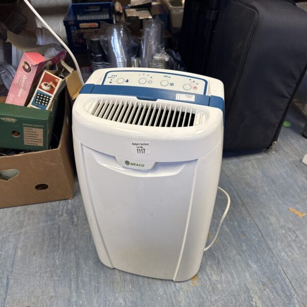 Front view of a white Meaco dehumidifier in used condition.