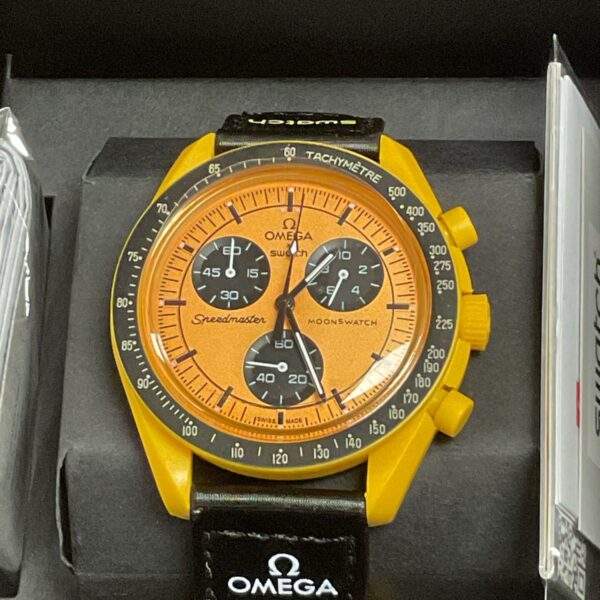 Front view of the yellow Omega Swatch MoonSwatch Mission to the Sun watch.