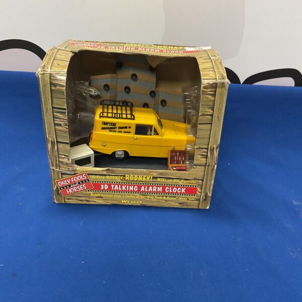 Vintage Wesco Only Fools and Horses alarm clock featuring the van.