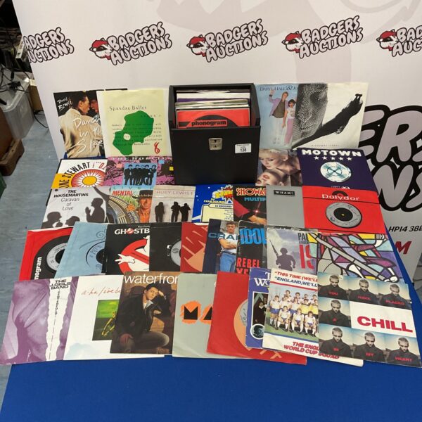 Lot of 7 inch vinyl records including David Bowie singles.