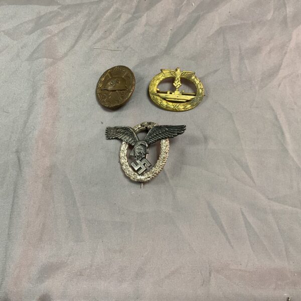Lot of three WW2 German badges for military collectors.