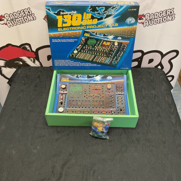 Vintage Science Fair 130-in-One Electronic Project Lab kit with components.