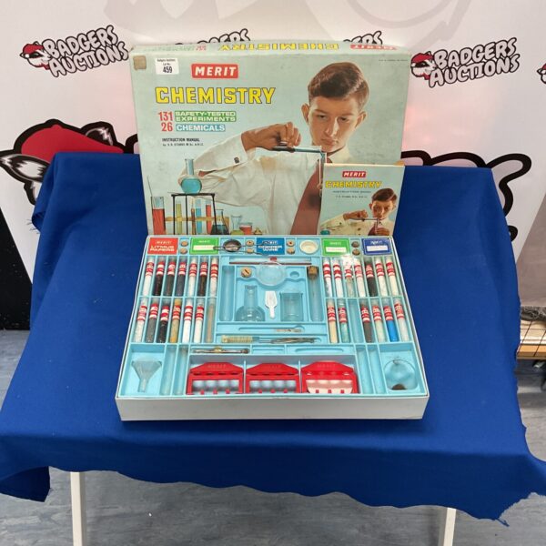 Vintage Merit chemistry set model 451 with experiment manual.