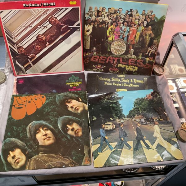 Vinyl record collection featuring Beatles and Crosby Stills Nash albums.