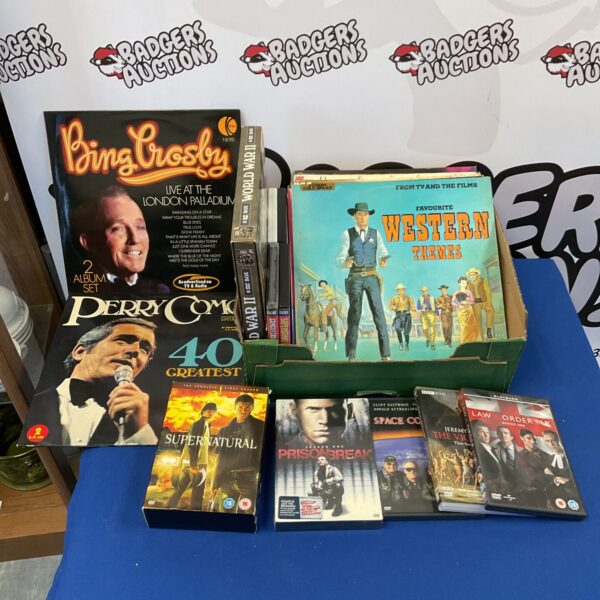 Mixed lot of vinyl records and DVDs featuring Bing Crosby.