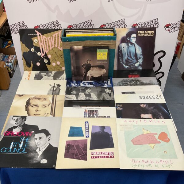 Assorted vinyl records including David Bowie, The Style Council, and Eurythmics.