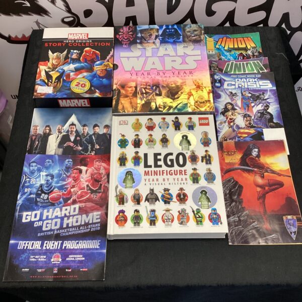 Book and comic collection featuring Star Wars, Lego, and Marvel titles.