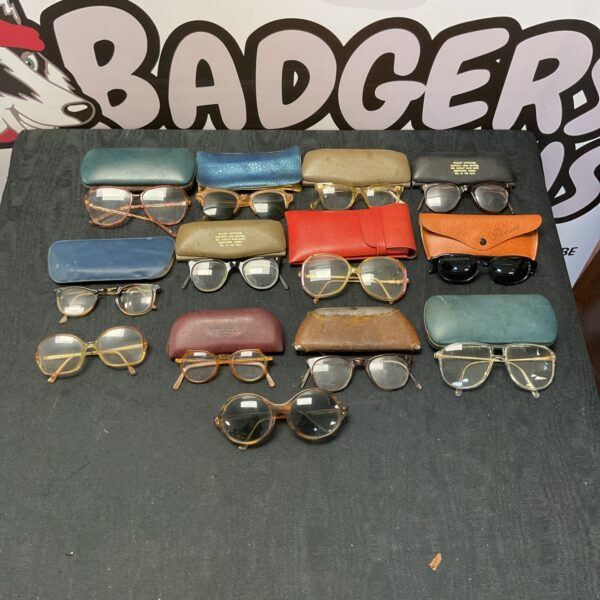 Vintage sunglasses and glasses lot featuring Polaroid and Willett Optical.