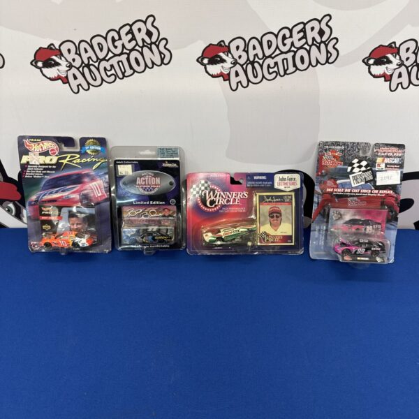 Sealed Hot Wheels NASCAR diecast cars in original packaging.