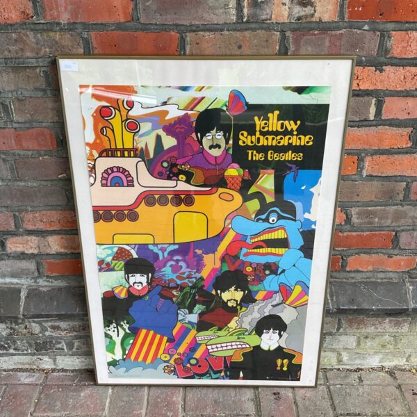 Large vintage Beatles Yellow Submarine print with psychedelic artwork.