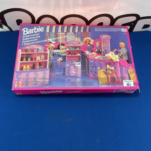 Vintage Barbie supermarket playset with colourful shelving and grocery items.
