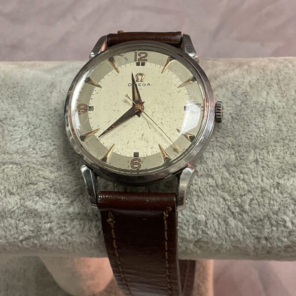 Front view of a vintage Omega mechanical wristwatch.