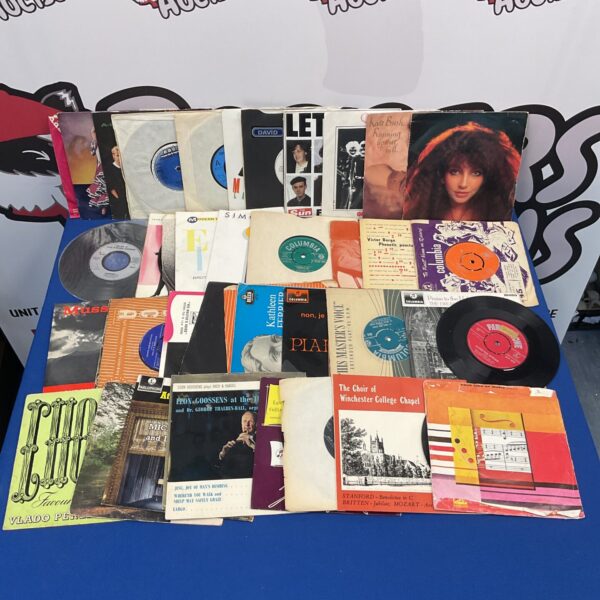 Lot of vintage 7 inch vinyl records including Kate Bush.