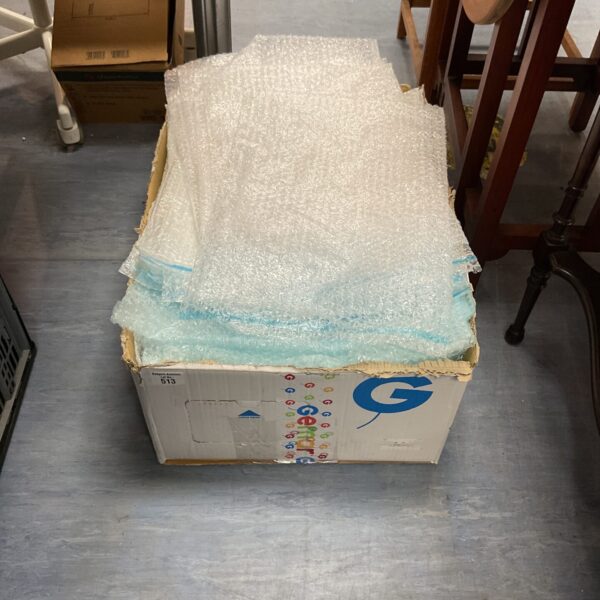 Lot of approximately 50 bubble wrap bags in a cardboard box.