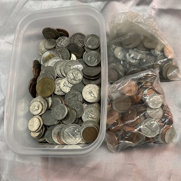 Mixed lot of American coins in a tub and bags.