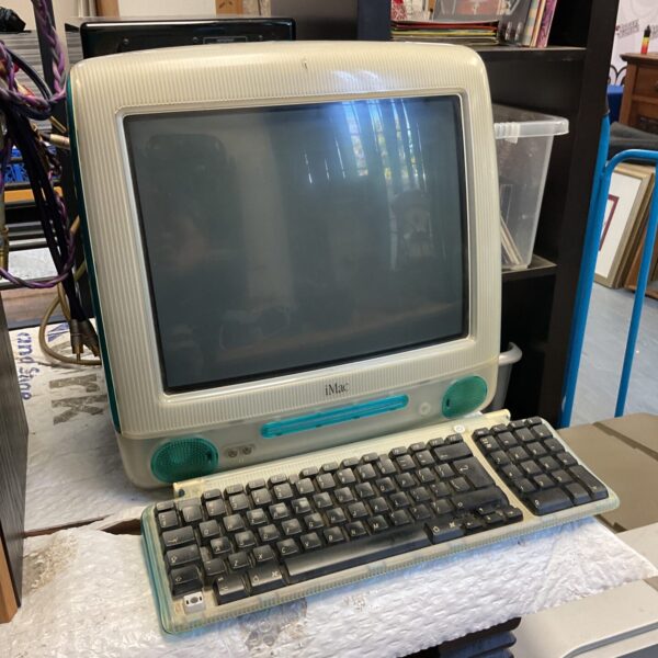 Vintage Bondi Blue iMac G3 desktop computer for collectors.