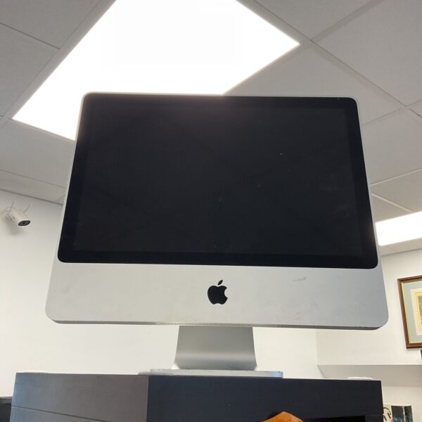 Vintage Apple iMac A1224 computer with sleek design.