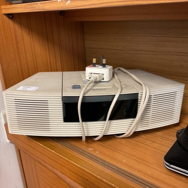 Vintage Bose Wave Radio CD System tabletop audio player.