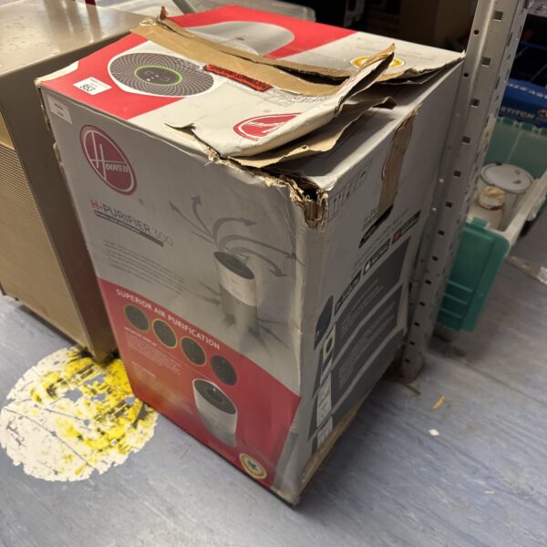 Used Hoover H-Purifier 300 air purifier in damaged packaging.